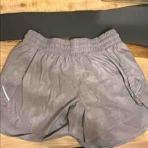 Silvery/gray running shorts